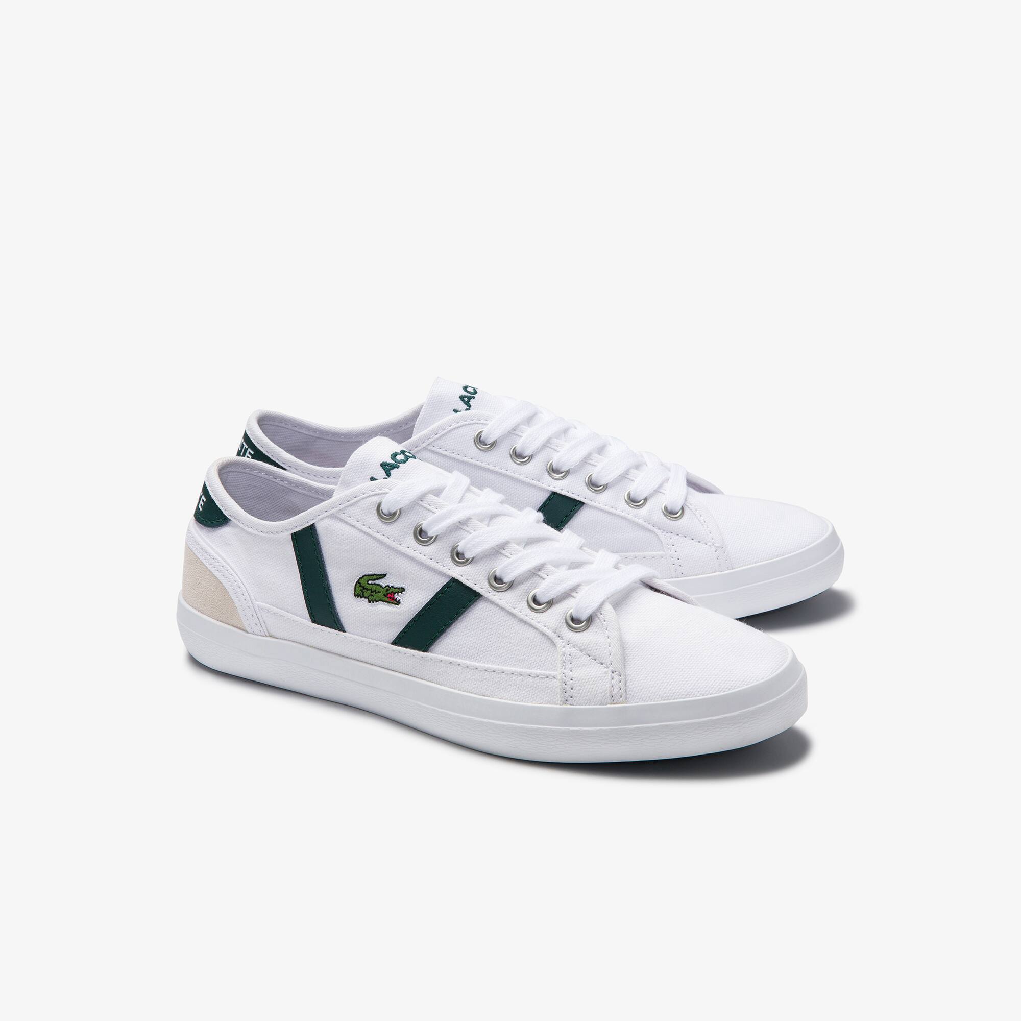 white canvas plimsolls womens