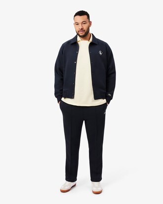 Loose Fit-Polohemd aus Fleece mit Badge-Akzent