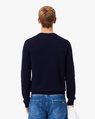 Einfarbiger Pullover aus Baumwolle mit V-Ausschnitt