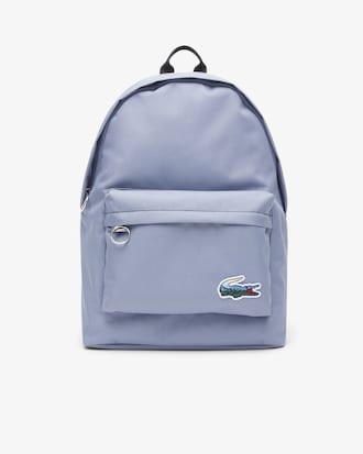 Rucksack mit Krokodil und Landschaft