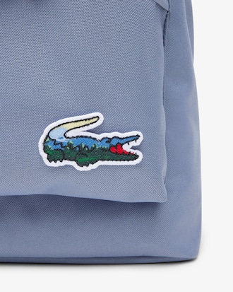 Rucksack mit Krokodil und Landschaft
