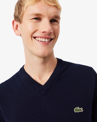 Einfarbiger Pullover aus Baumwolle mit V-Ausschnitt