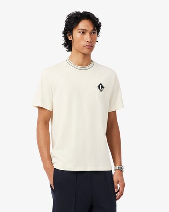 Franz&ouml;sisches T-Shirt mit Badge-Akzent