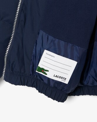 Daunenjacke mit Kapuze und Colorblock-Design