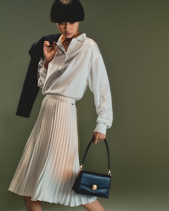 Ledertasche Tennis Bliss mit Klappverschluss