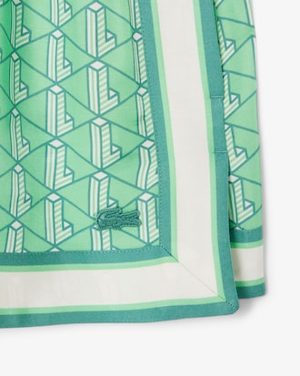 Fließende Shorts mit Monogramm-Druck
