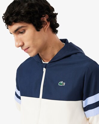Wasserabweisende Tennisjacke mit Kapuze