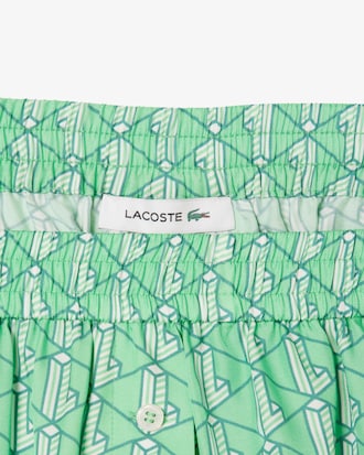 Fließende Shorts mit Monogramm-Druck