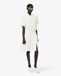 Polokleid Runway mit Stickdetails und Faltenrock