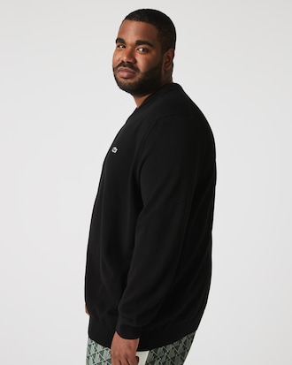 Einfarbiger Pullover aus Baumwolle mit V-Ausschnitt