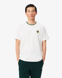 Franz&ouml;sisches T-Shirt mit Streifen und Badge-Akzent