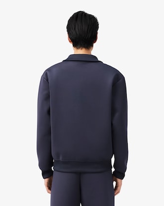 Jacke mit hohem Nacken und gestickter Unterschrift