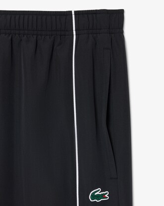 Pantalon de surv&ecirc;tement Sport d&eacute;perlant liser&eacute;s