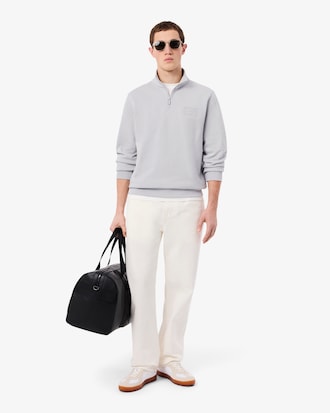 Sweatshirt col montant zipp&eacute; marquage emboss&eacute;