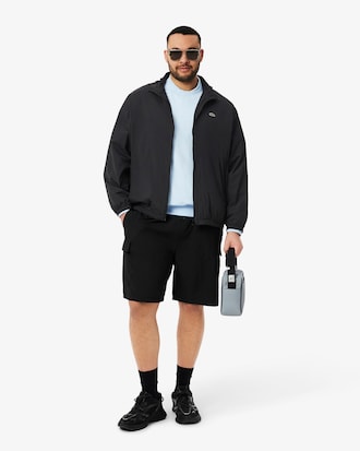 Veste de survêtement à capuche déperlante