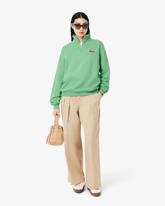 Sweatshirt col zippé loose fit avec badge