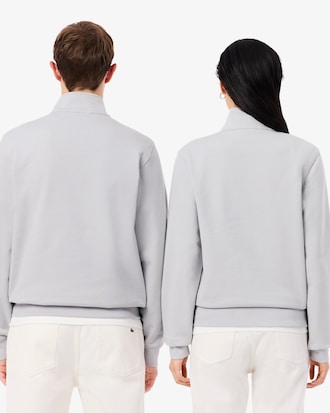Sweatshirt col montant zipp&eacute; marquage emboss&eacute;