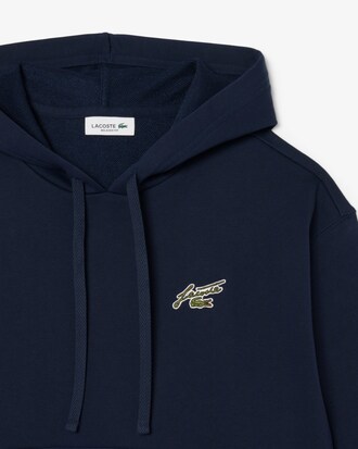 Sweatshirt &agrave; capuche en molleton badge