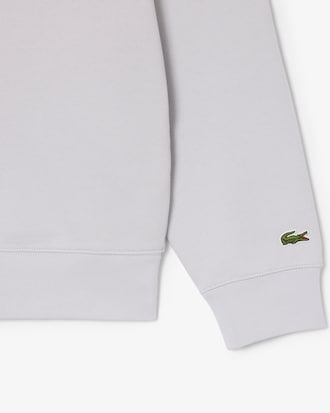 Sweatshirt col montant zipp&eacute; marquage emboss&eacute;