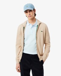 Pull zipp&eacute; coton uni col montant
