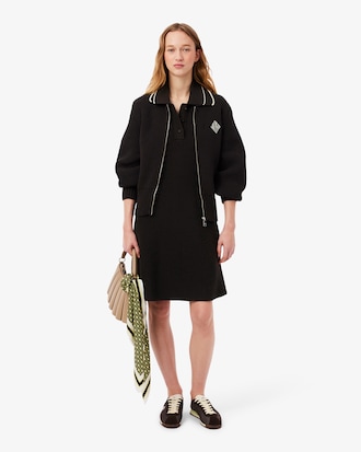 Katoenen Polojurk met Badge Accenten