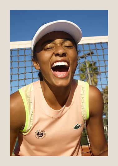 Tennis player wearing Lacoste Tennis Performance top