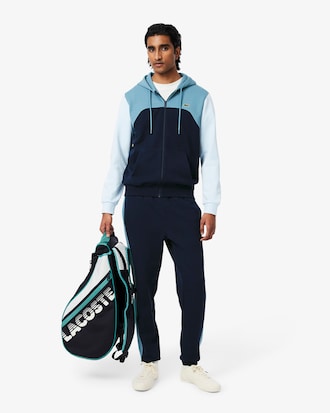 Trainingshose mit zulaufenden Beinen und Colorblock-Design