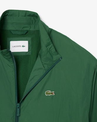 Wasserabweisende Trainingsjacke mit Kapuze