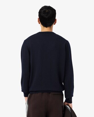 Einfarbiger Pullover aus Merinowolle mit V-Ausschnitt