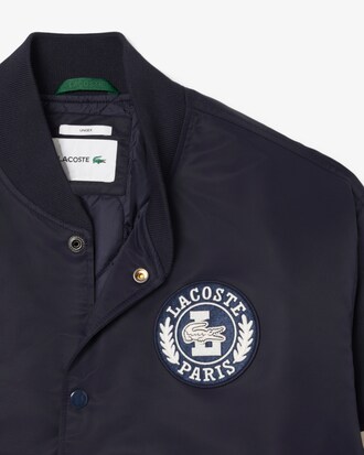 Bomberjacke aus wasserabweisendem Nylon mit gesticktem Badge