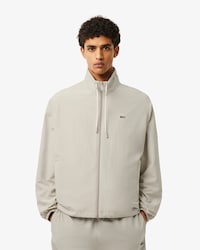 Trainingsjacke mit abnehmbarer Kapuze