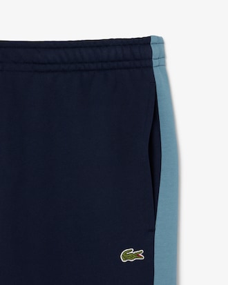 Trainingshose mit zulaufenden Beinen und Colorblock-Design