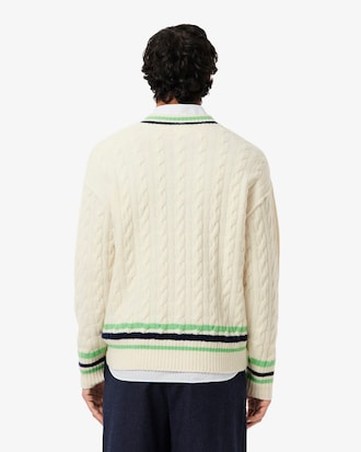 Pullover aus Wolle mit V-Ausschnitt und Zopfmuster