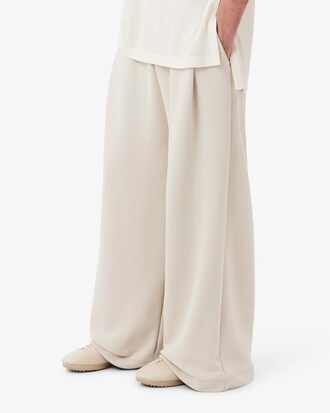 Pantalon de surv&ecirc;tement satin&eacute; D&eacute;fil&eacute;