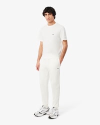 Pantalon de surv&ecirc;tement bandes griff&eacute;es