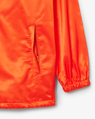 Veste de surv&ecirc;tement brillante D&eacute;fil&eacute;