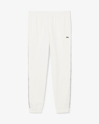 Pantalon de surv&ecirc;tement bandes griff&eacute;es