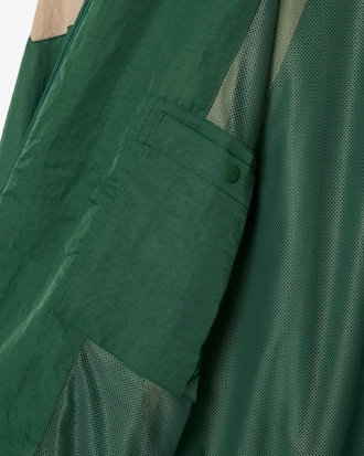 Veste de surv&ecirc;tement color-block Lacoste x Wang Yibo