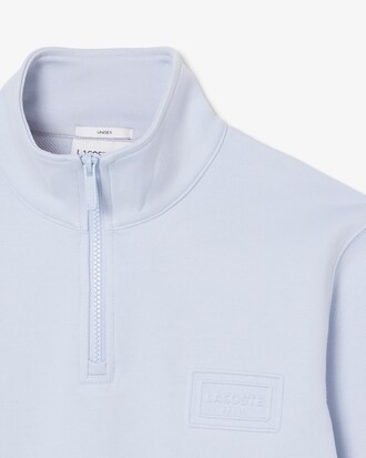 Sweatshirt col montant zipp&eacute; marquage emboss&eacute;
