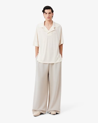 Pantalon de surv&ecirc;tement satin&eacute; D&eacute;fil&eacute;