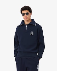Sweatshirt col montant zipp&eacute; badge loose fit