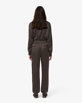 Pantalon de surv&ecirc;tement oversize satin&eacute;