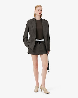 Mini-jupe bi-mati&egrave;re laine D&eacute;fil&eacute;