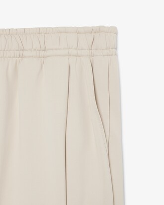 Pantalon de surv&ecirc;tement satin&eacute; D&eacute;fil&eacute;