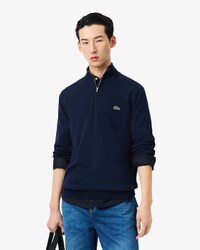 Pull zipp&eacute; coton uni col montant