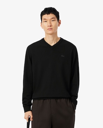 Maglione con scollo a V monocromatico in lana merino