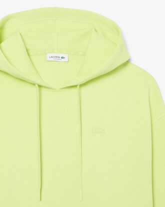 Felpa oversize con cappuccio regolabile