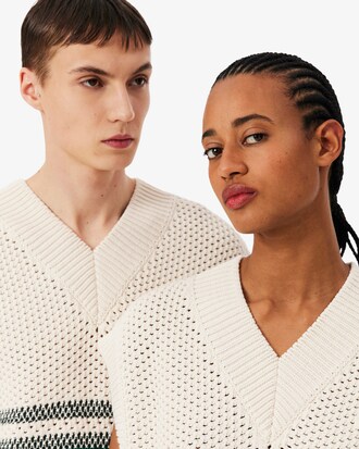 Gilet in piqu&eacute; traforato a righe