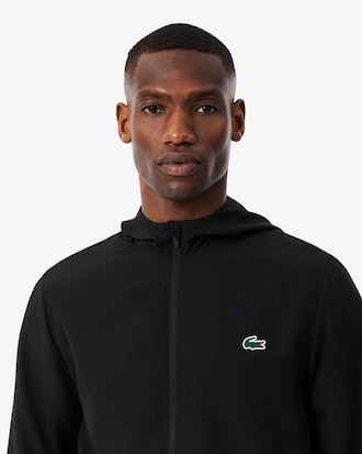 Giacca della tuta sportiva idrorepellente