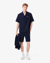 Shorts felpati color block